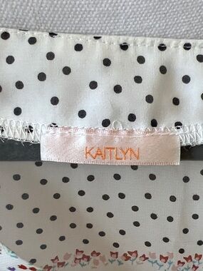 Kaitlyn White Blouse with Black Polka Dots and Floral Trim